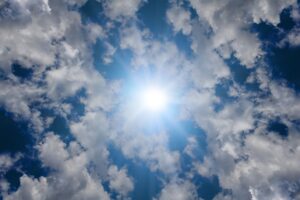 Faith becomes sight—heavenly light shining through clouds symbolizing belief in the unseen
