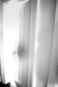 Open door with light shining through symbolizing finding Jesus