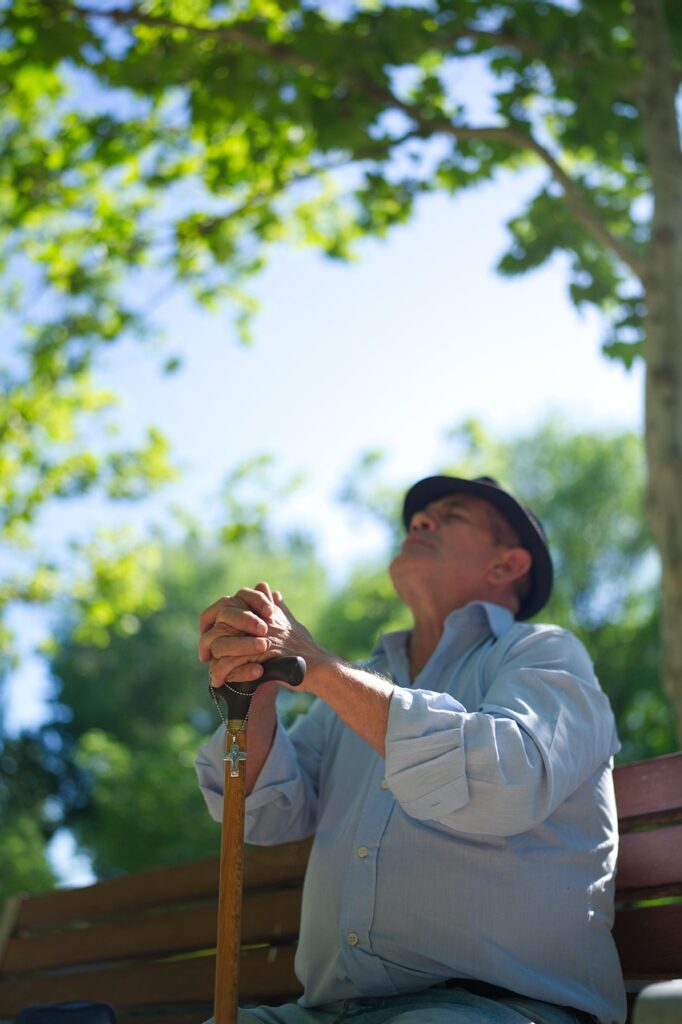Man raising hands in worship declaring I believe