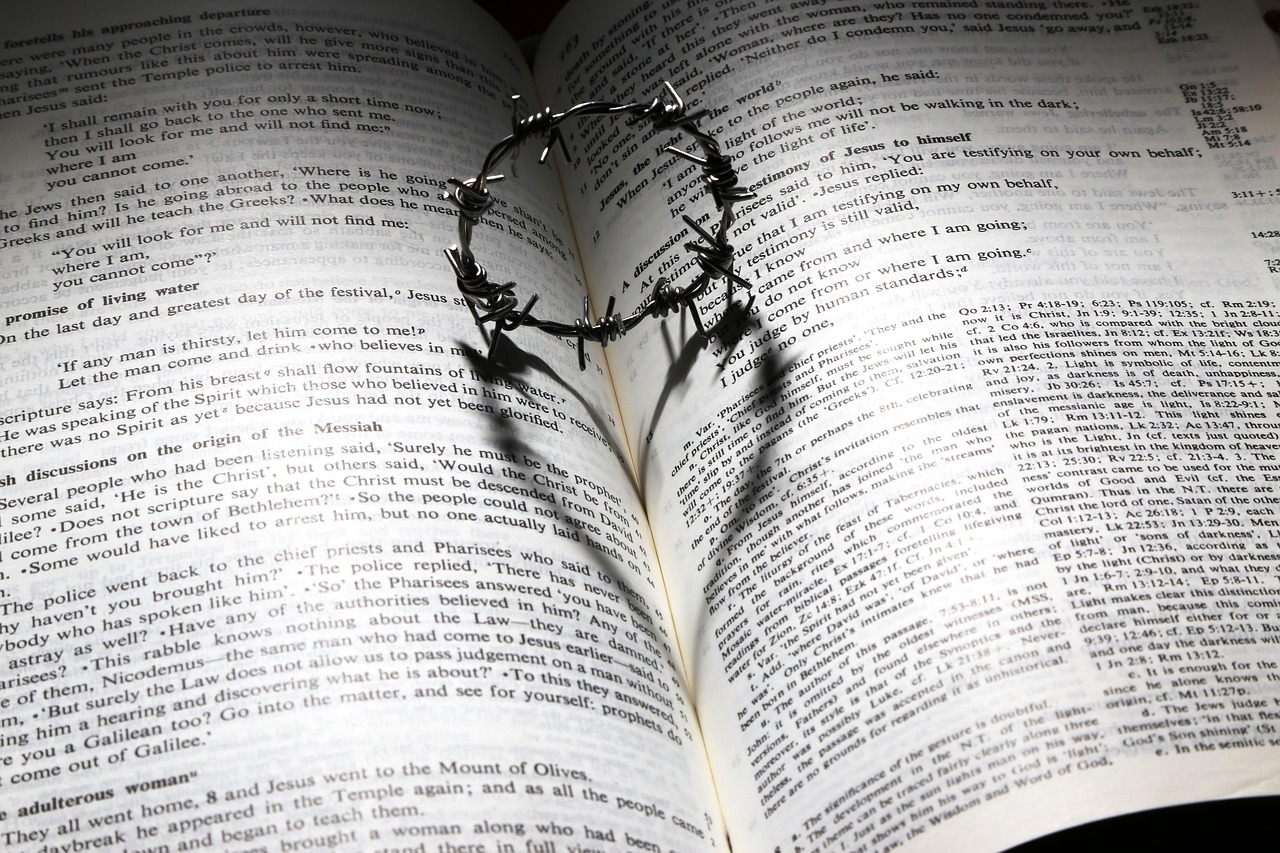 Open Bible with soft morning light symbolizing faith expressing itself in love