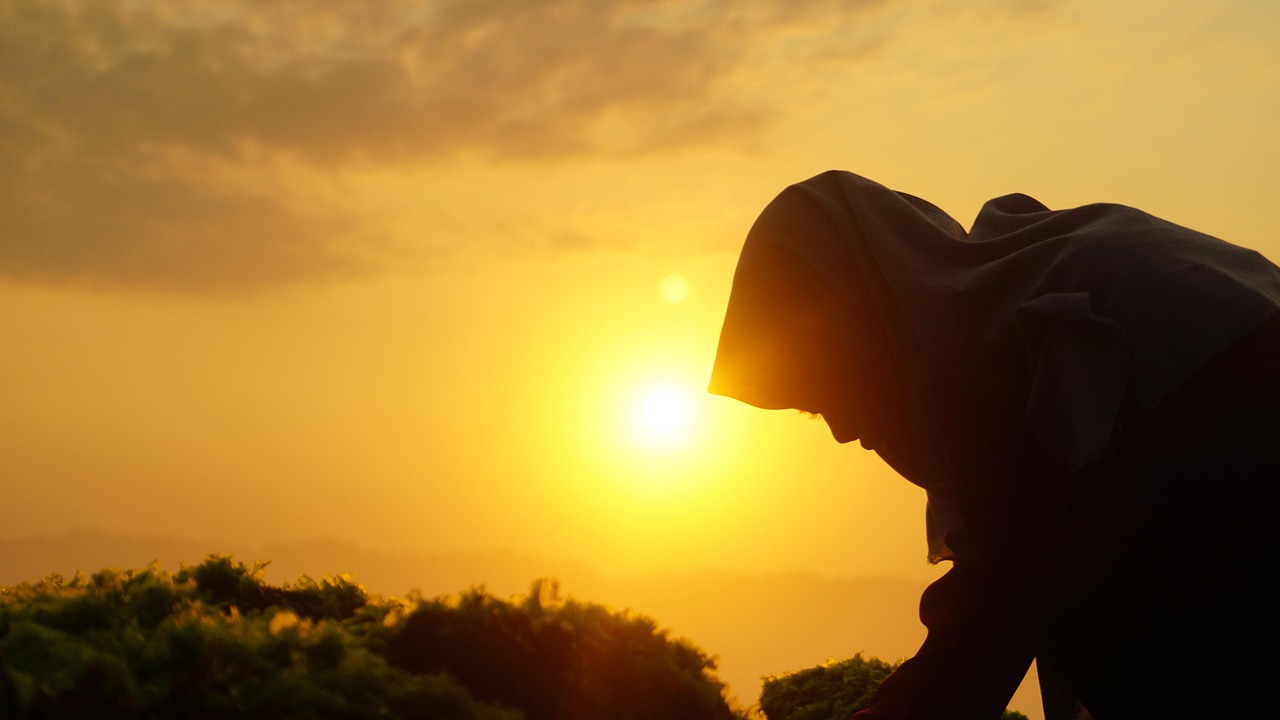 sunrise light breaking through darkness symbolizing spiritual awakening