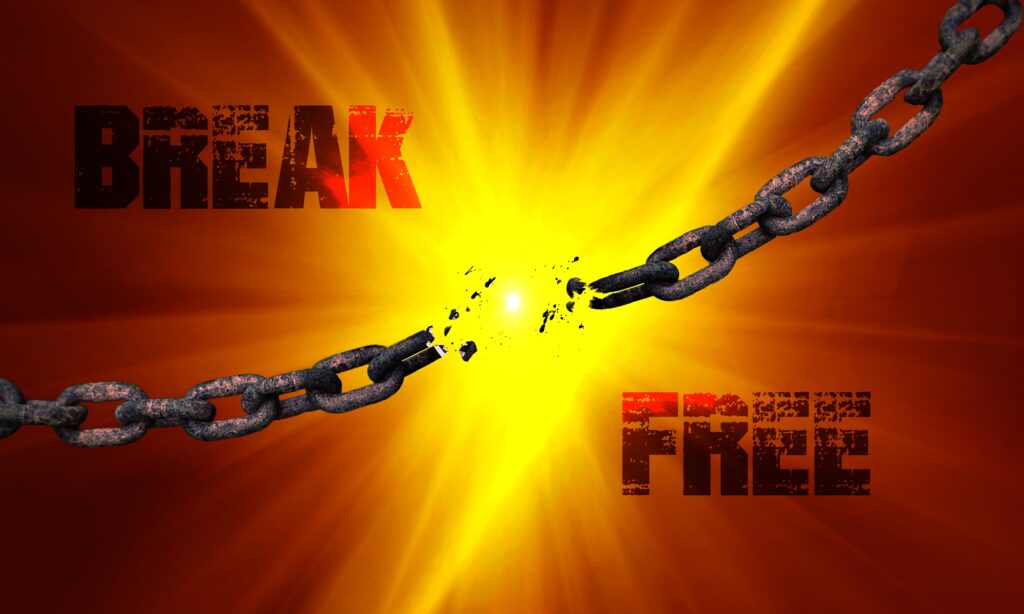 Broken chains symbolizing freedom through Jesus Christ