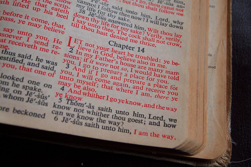 Light shining over an open Bible symbolizing God's kingdom.