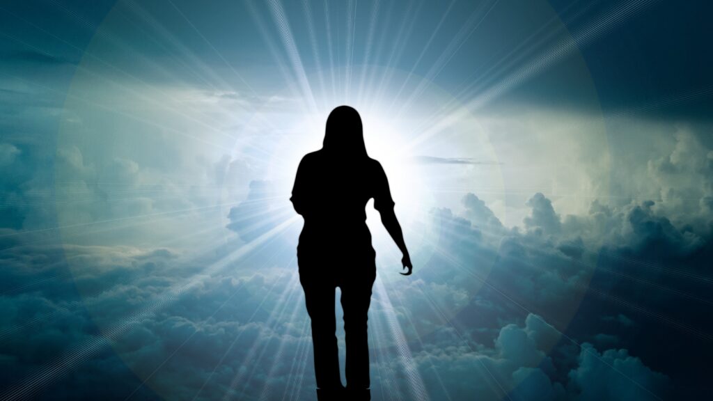 Believer stepping forward in faith toward God's light.