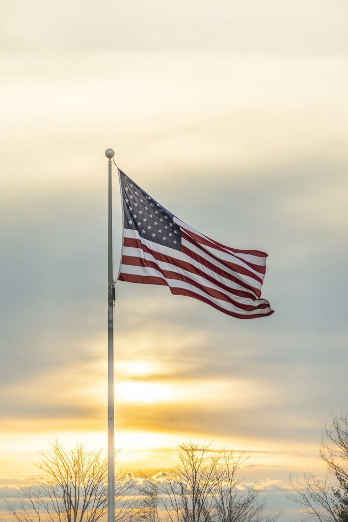 American Flag at sunrise symbolizing God Bless America