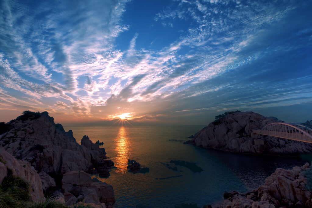 A comforting sunrise over peaceful mountains symbolizing God's presence during seasons of grief, sorrow, and hope.
