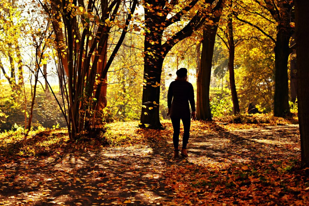 Person walking a peaceful path by faith and trusting Jesus
