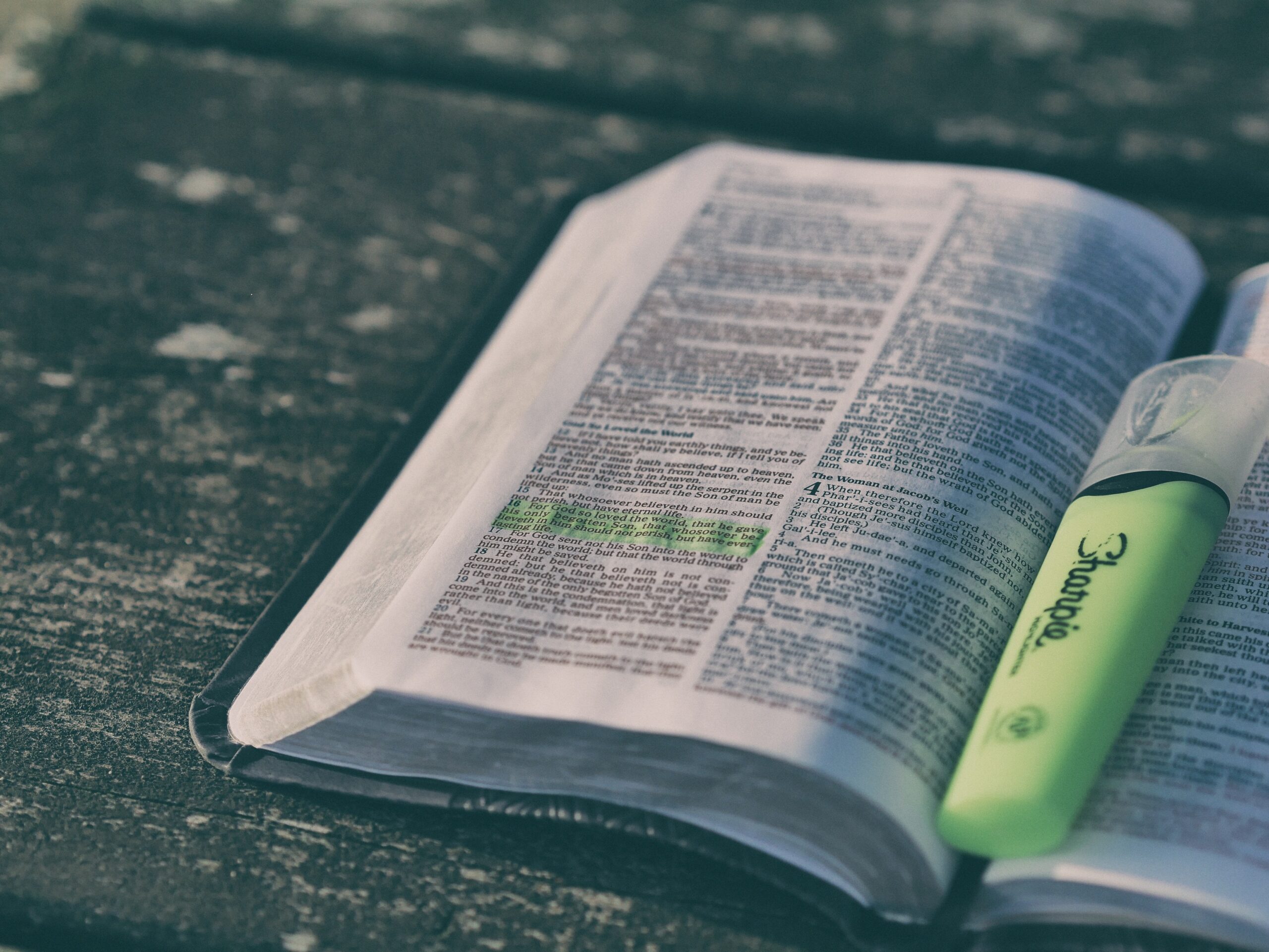 Open Bible with sunrise light symbolizing victory and faith in Jesus