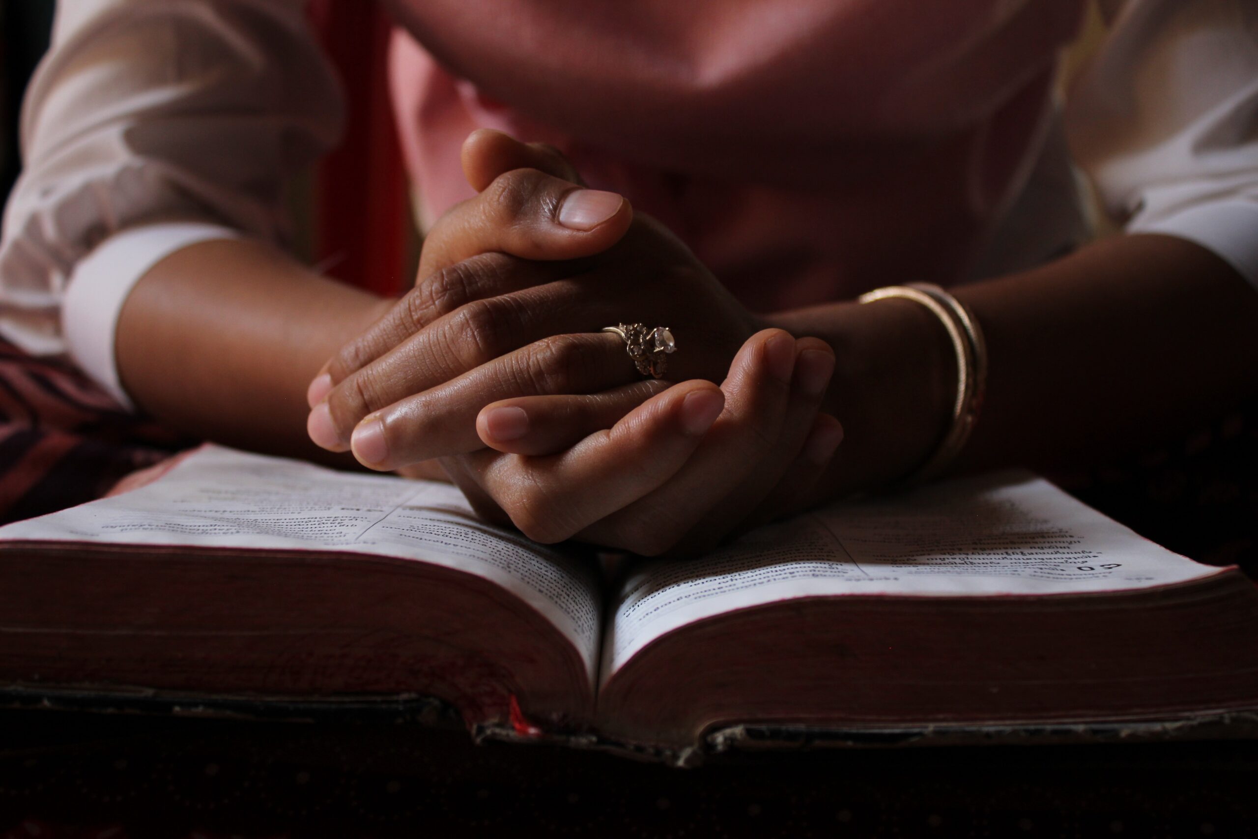 Open Bible with soft morning light, symbolizing worship of the Creator