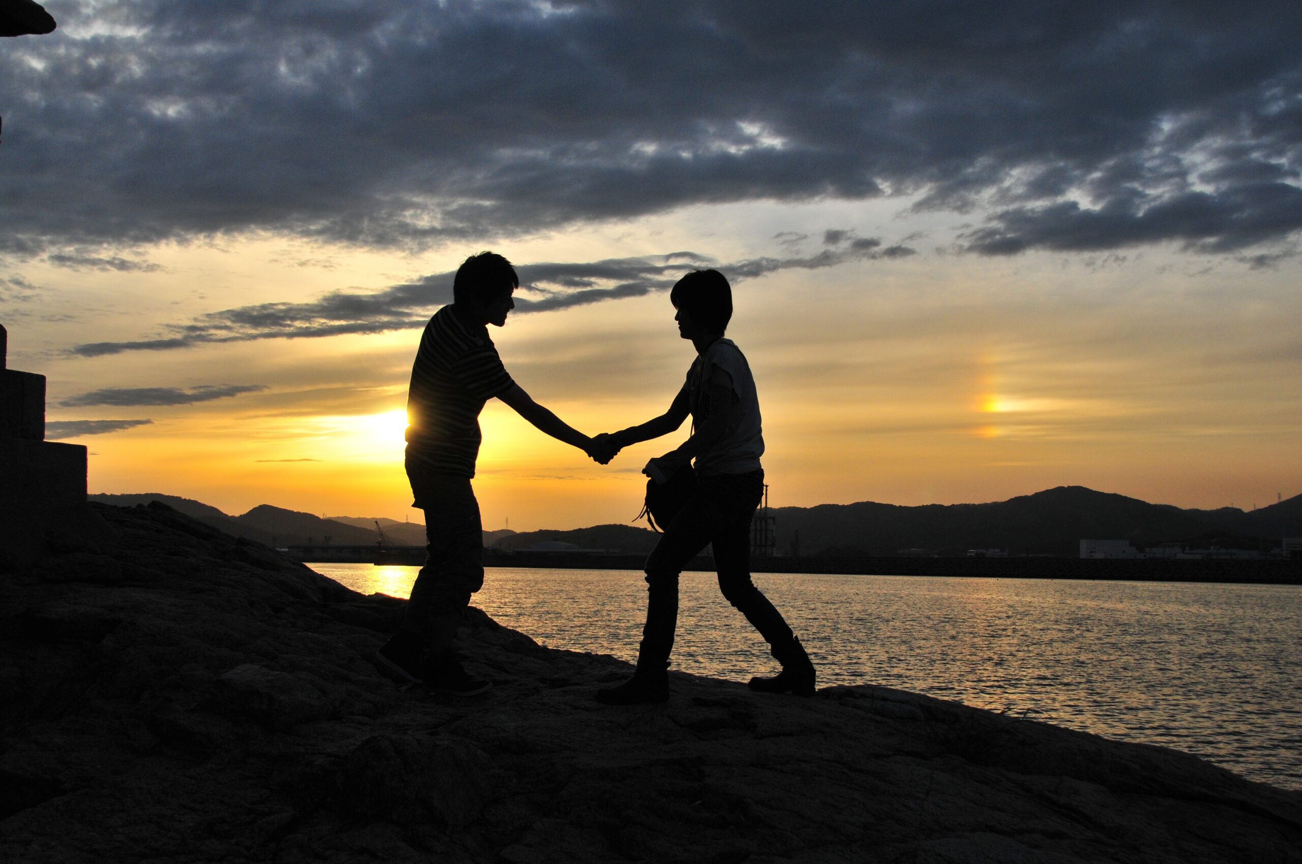 Person speaking encouragement to friend, symbolizing the power of our words